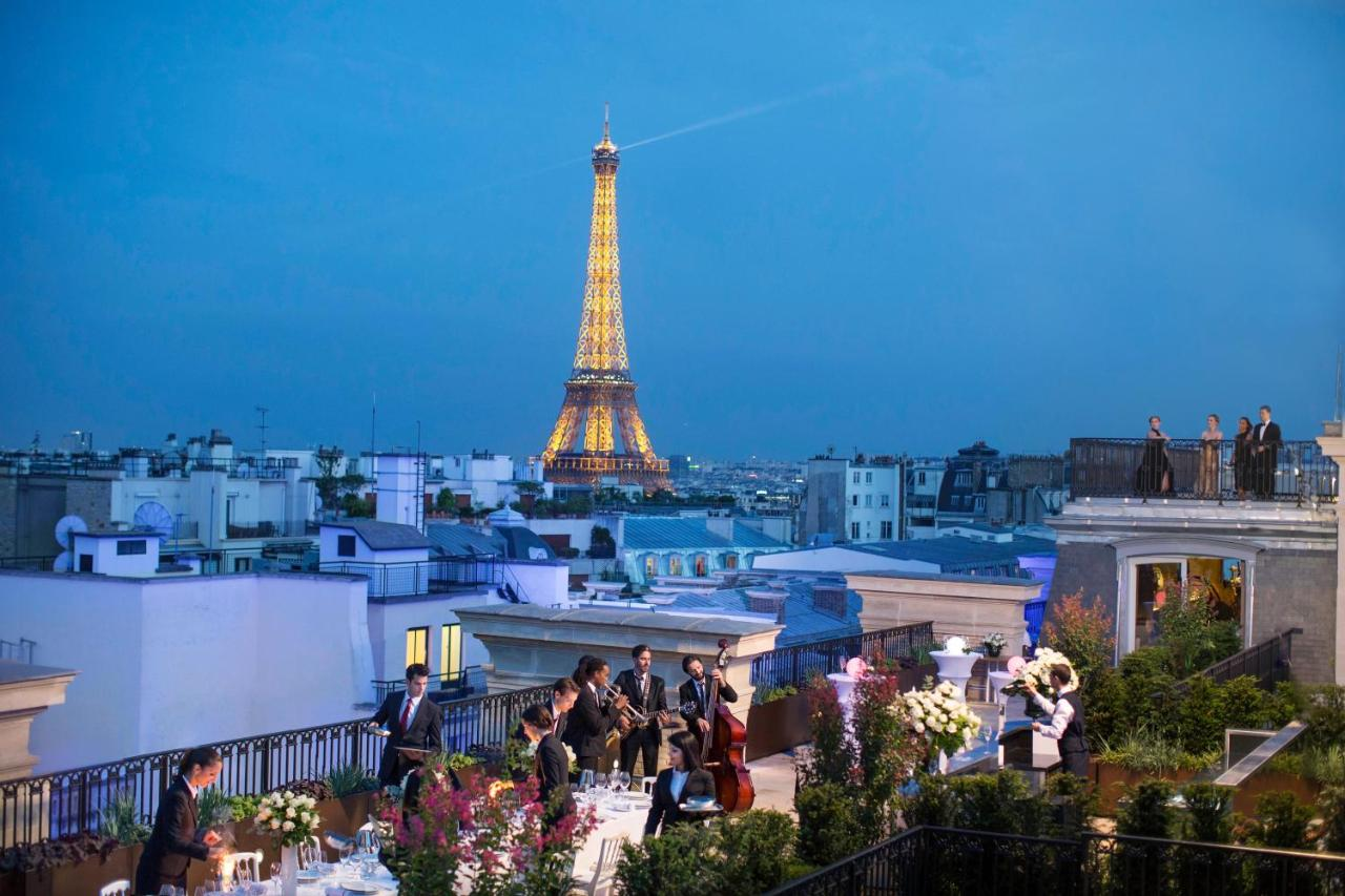 eco friendly hotel overlooks eiffel tower